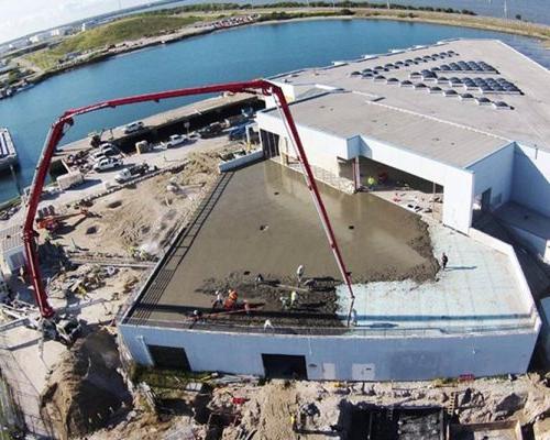 Aerial photo of Canaveral Port Authority Cruise Terminal 5. Concrete pour in progress.